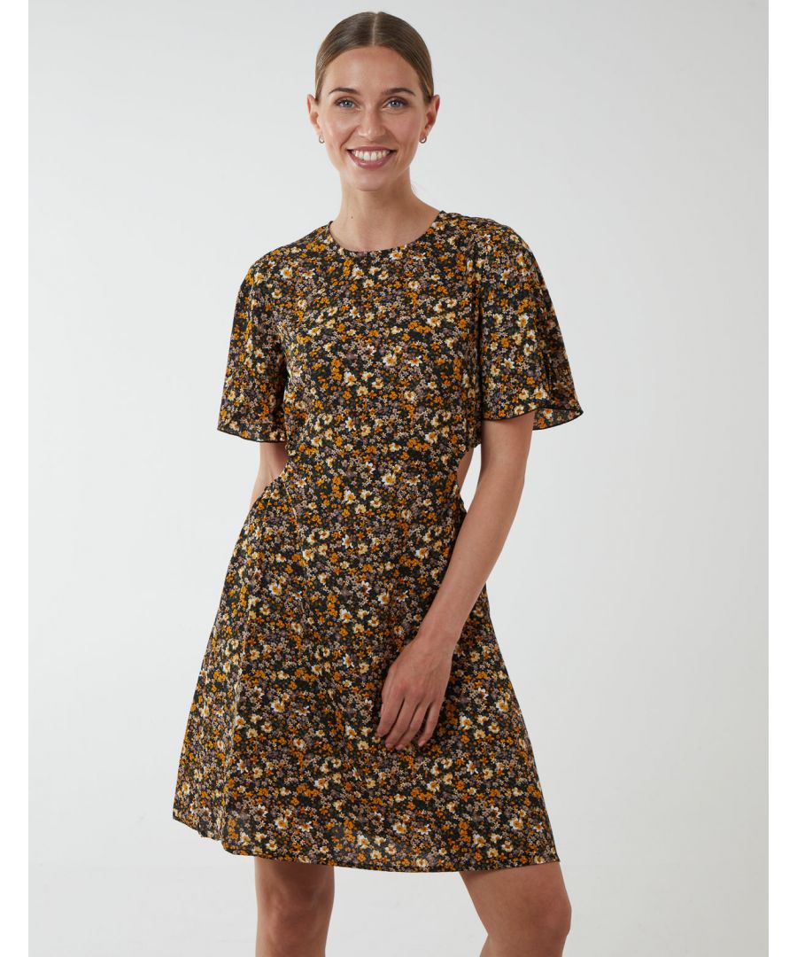 Whether you are going on casual drinks with friends or a date night, the Floral Print Crew Neck Dress With Side Cut Outs is perfect for you. This adorable dress also features short sleeves and a mini length. Match high knee boots and layer with a warm coat. \n100% polyester 