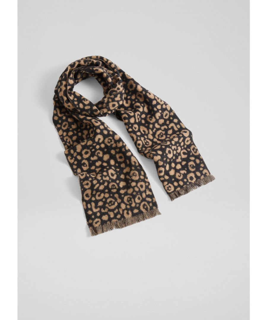 One of our favourite prints, and true wardrobe classic, our Brooke leopard print scarf is the perfect way to a bit of print and playfulness to your winter wardrobe. Beautifully-crafted from soft and warm wool, it's a long, reversible style in beige and brown with a stylish fringed edge. Wear it to dress up classic black coats or layered with knitwear on chilly days around the house.