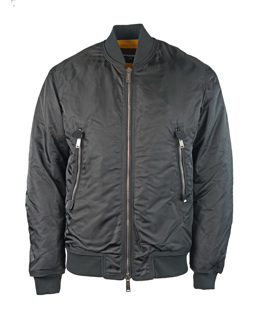 DSquared2 S71AM0985 S49350 900 Jacket. Black down 'bomber' jacket from Dsquared2. Fastened with a double zip in silver. On the back a sewn on logo in black. Two front zippered pockets. Outer Layer Polyamide/Cotton/Elastane, Padding Goose Down/Goose Feather