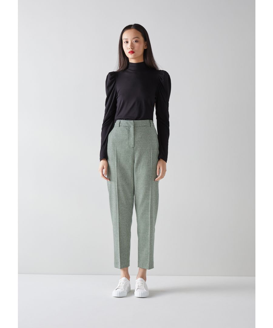 Cut to a slim, tailored fit, our Nina trousers are the perfect autumnal smart trouser. Crafted from an Italian wool-blend fabric in a rich forest green and cream dogtooth check, these ankle-length trousers sit on the waist, have belt loops, side pockets, back slit pockets and are finished with pressed creases. Wear them with a silk shirt or a lightweight luxurious knit.