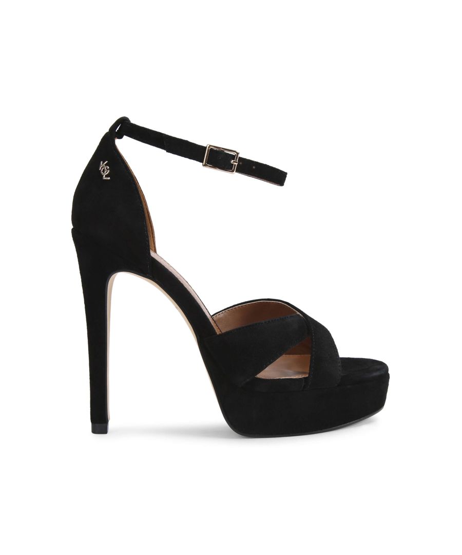 The KGL Proud Platform heel features a black suede leather upper with strappy toe. The ankle is fastened with small gold buckle. Heel height: 11.5cm. Platform height: 3cm.