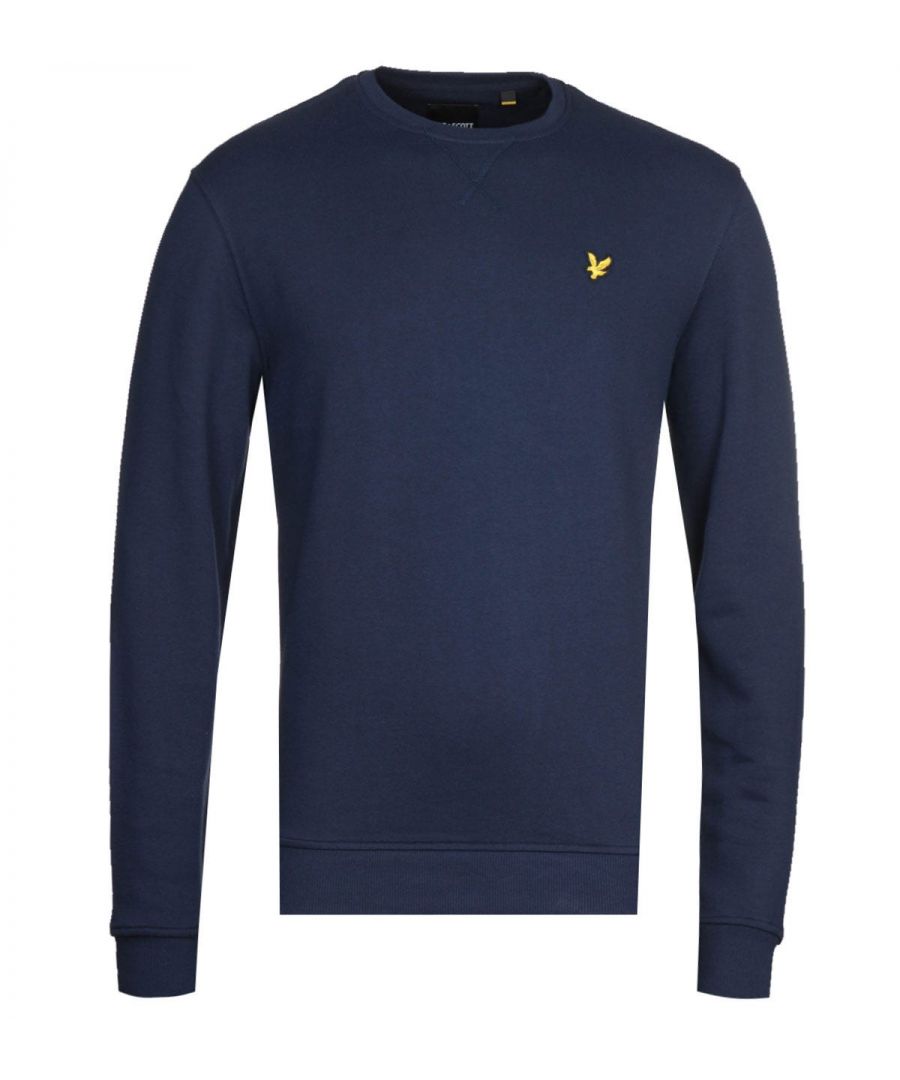 Mens Lyle and Scott Crew Neck Sweatshirt in navy.- Ribbed crew neckline featuring a ribbed V panel.- Long sleeves.- Ribbed cuffs & waistband.- Lyle & Scott golden eagle embroidered to the left of the chest.- Regular fit.- 100% Cotton.  Machine wash at 30 degrees.- Ref: ML424VTRZ99