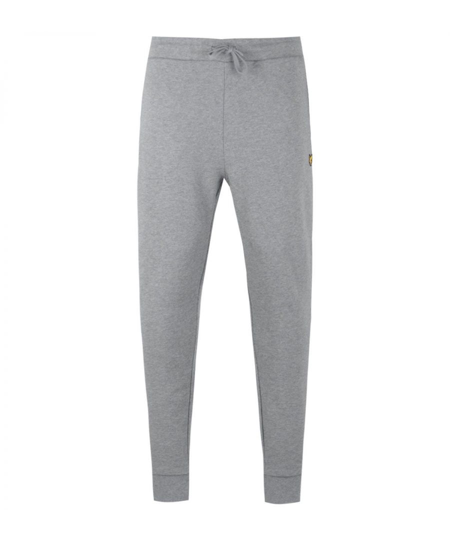 Mens Lyle And Scott Skinny Jog Pants in grey.- Drawstring waistcord.- Two side pockets.- Ribbed ankle cuffs.- Embroidered details.- Signature Lyle and Scott Golden eagle branding.- 100% Cotton. Machine washable. - Ref: ML822VTRT28