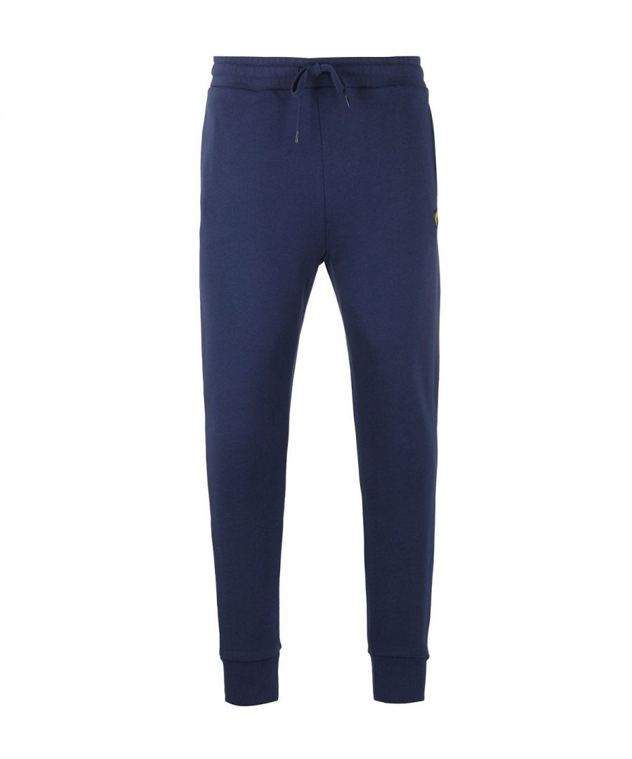 Mens Lyle And Scott Skinny Jog Pants in navy.- Drawstring waistcord.- Two side pockets. One back pocket.- Ribbed ankle cuffs.- Signature Lyle and Scott Golden eagle branding.- 100% Cotton. Machine washable. - Ref: ML822VTRZ99