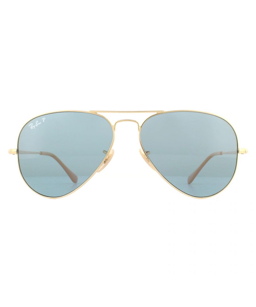Ray-Ban Sunglasses RB3689 9064S2 Gold Blue Polarized are an update of the classic Aviator. The 3689 are almost identical to the 3025 Aviator, but with new flat temples. The legendary Aviator is characterised by the iconic teardrop shaped lenses and double bridge. Plastic temple tips and adjustable nose pads ensure comfort and this model is available in two sizes; small and medium so you are guaranteed to find a pair that are perfect for you!