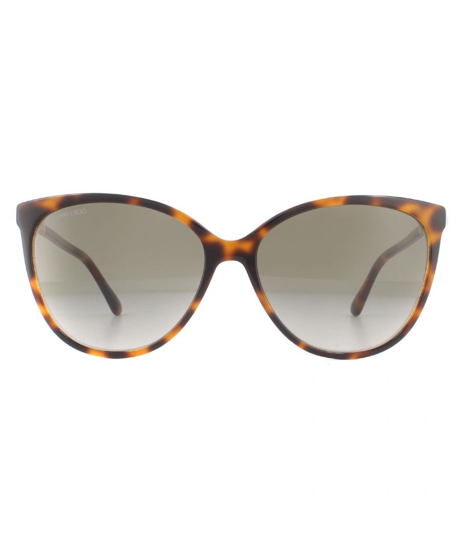 Jimmy Choo Sunglasses Lissa/S 0T4 HA Havana Pink Brown Gradient are a cat eye style crafted from lightweight acetate. The hinges feature a metal glittery section and are finished with the Jimmy Choo logo engraved into the temples.