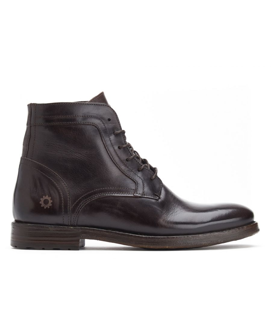 This lace-up boot from Base London has been crafted from soft grain leathers by the finest Portuguese boot makers and hand finished for a rich burnished look. The six lace closing provides a secure fit and the cleated sole makes for a confident step. Cassidy features the Base London ëMotobootí branding  adding to the roguish nature of this Menís Boot.