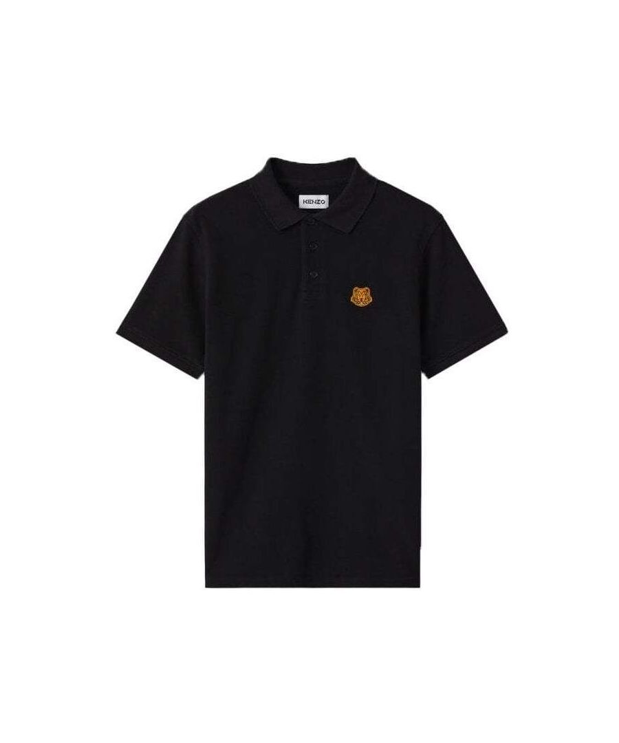 This black Tiger Crest Polo is crafted from cotton and features buttons, a collar that stand out due to the iconic Tiger embroidery on the chest.