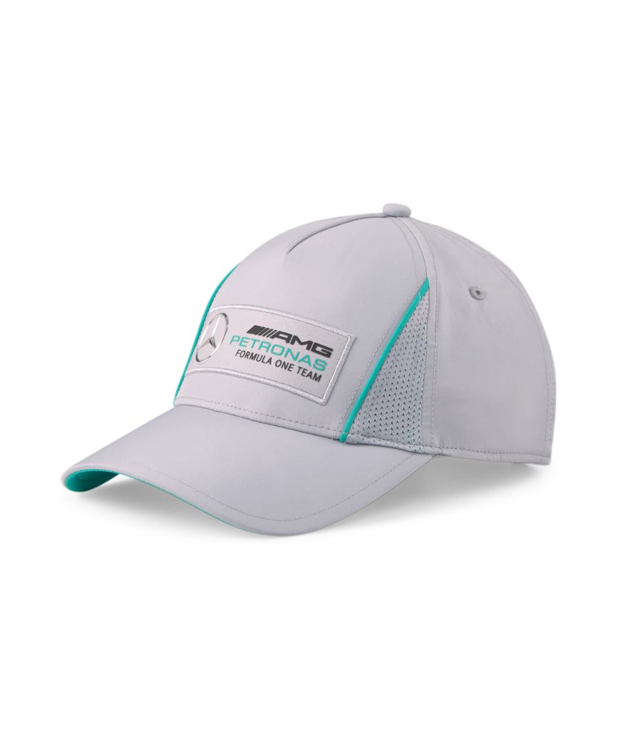 PRODUCT STORY High-octane style meets performance in this smart Mercedes-AMG Petronas Motorsport cap. The classic construction is elevated with striking contrast colour details on the front and the undervisor. The iconic Mercedes-AMG Petronas Motorsport logo sits proudly on the front while the PUMA Cat logo pounces across the back. Mesh details on the crown add a touch of aircon – so petrolheads can keep their cool when the action heats up. DETAILS: Classic baseball cap constructionMesh detailsMercedes-AMG Petronas F1 high-density logo print at the frontPUMA Cat Logo at the back100% Polyester
