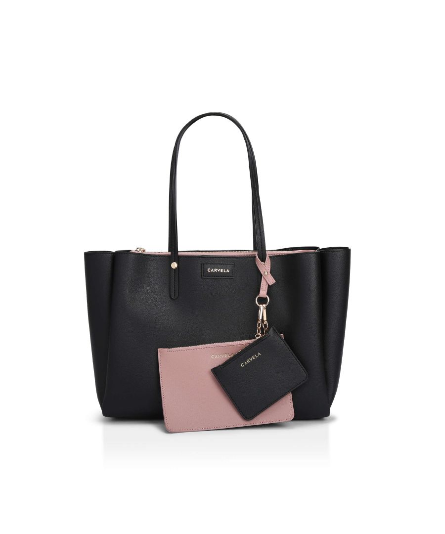 Prepare to fall for the multi-functional appeal of Freya Triple Compart Tote. Styled in black, this spacious tote has a zipped opening which opens to an unlined interior. There is also a zipped wallet which is removable for grab and go items.