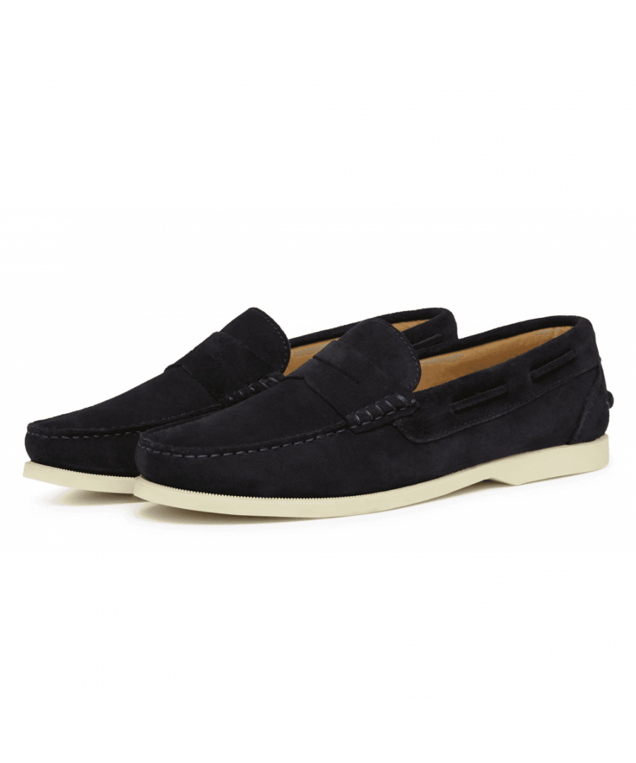 A casual moccasin suede loafer from Oliver Sweeney's specialist factory in Spain. A classic penny loafer, the style has a hand-stitched saddle and apron seam, with laced quarters and the traditional horizontal seam on the heel counter. The soft calf suede upper is fully lined in calf leather with a leather cushioned insock, and blake stitched to a rubber outsole.\nMoccasin ConstructionCalf suede upperLeather liningRubber solePadded footbed\nMade in Spain\n \n \n 