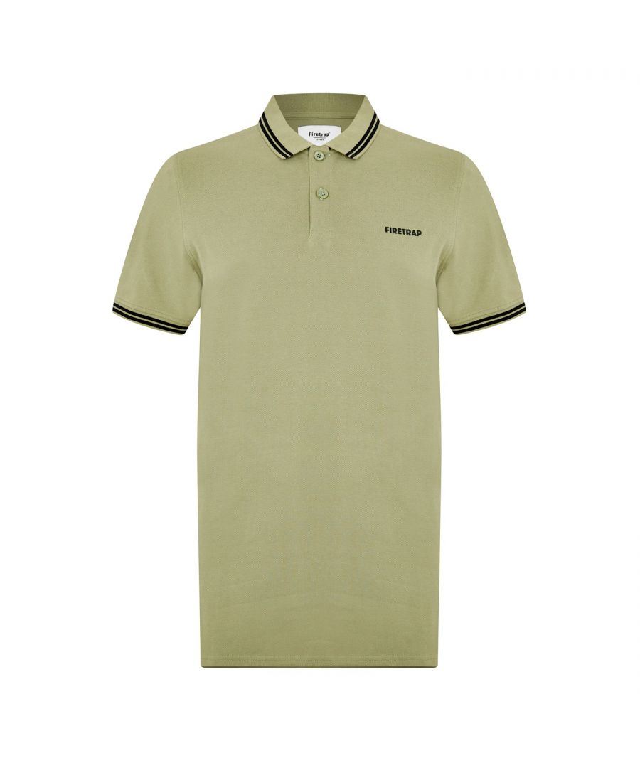 Firetrap Lazer Polo Shirt - Update your casual collection with the Lazer Polo Shirt from Firetrap. Featuring a 2 button placket, ribbed trims, and contrasting details, this piece makes the perfect addition to your off-duty wardrobe. Design is complete with Firetrap branding for a fresh urban look. > Associated Activity: Lifestyle > Length: Regular > Fit Type: Regular Fit > Sleeve Length: Short Sleeve > Collar Style: Polo > Fabric: Cotton > Pattern: Plain > Fastenings: Button Fastening > Model Size: Model Wears Size M > Care Instructions: Machine Washable, Follow Care Instructions > Style: Polo Shirts