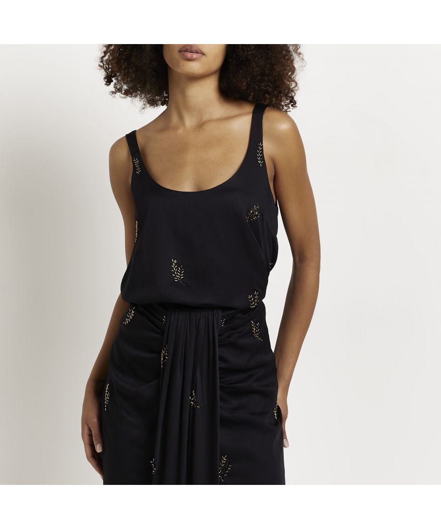 > Brand: River Island> Department: Women> Material: Viscose> Material Composition: 100% Viscose> Type: Tank> Style: Camisole> Pattern: Solid> Size Type: Regular> Fit: Regular> Closure: Pullover> Sleeve Length: Sleeveless> Season: SS22> Occasion: Casual