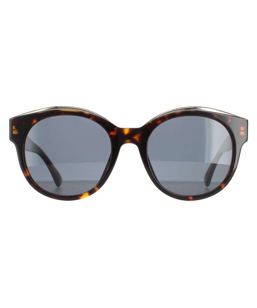 Moschino zonnebrillen MOS033/s 086 Dark Havana Gray zijn een trendy ronde stijl gemaakt van een dik acetaatframe. Het Moschino -logo verfraait de tempels voor authenticiteit.