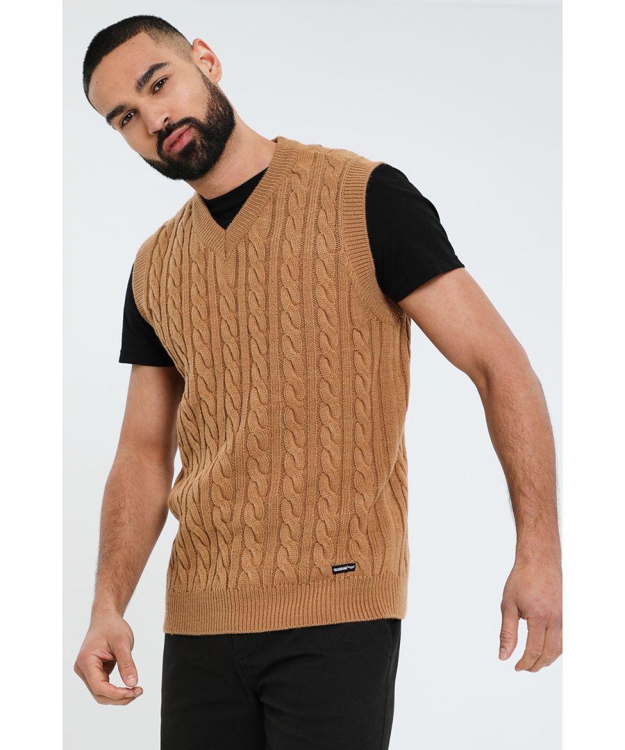 Upgrade your knitwear collection with this v neck knitted vest from Threadbare. This vest features a cable knit design and has ribbed armholes, neck and hem. Layer over a simple white tee and jeans for a casual look, or team with a shirt for a more formal style.