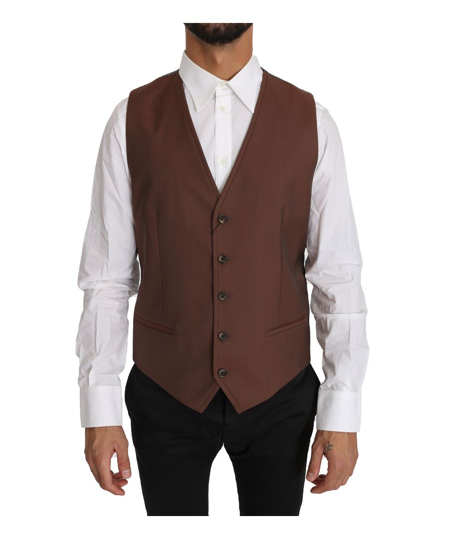 Dolce & ; Gabbana Gorgeous brand new with tags, 100% Authentic DOLCE & ; GABBANA vest. Modèle : Formal Vest Fit : Slim fit Couleur : Bronze front, gray back Full button closure Logo details Made in Italy Material : 60% Wool, 40% Silk