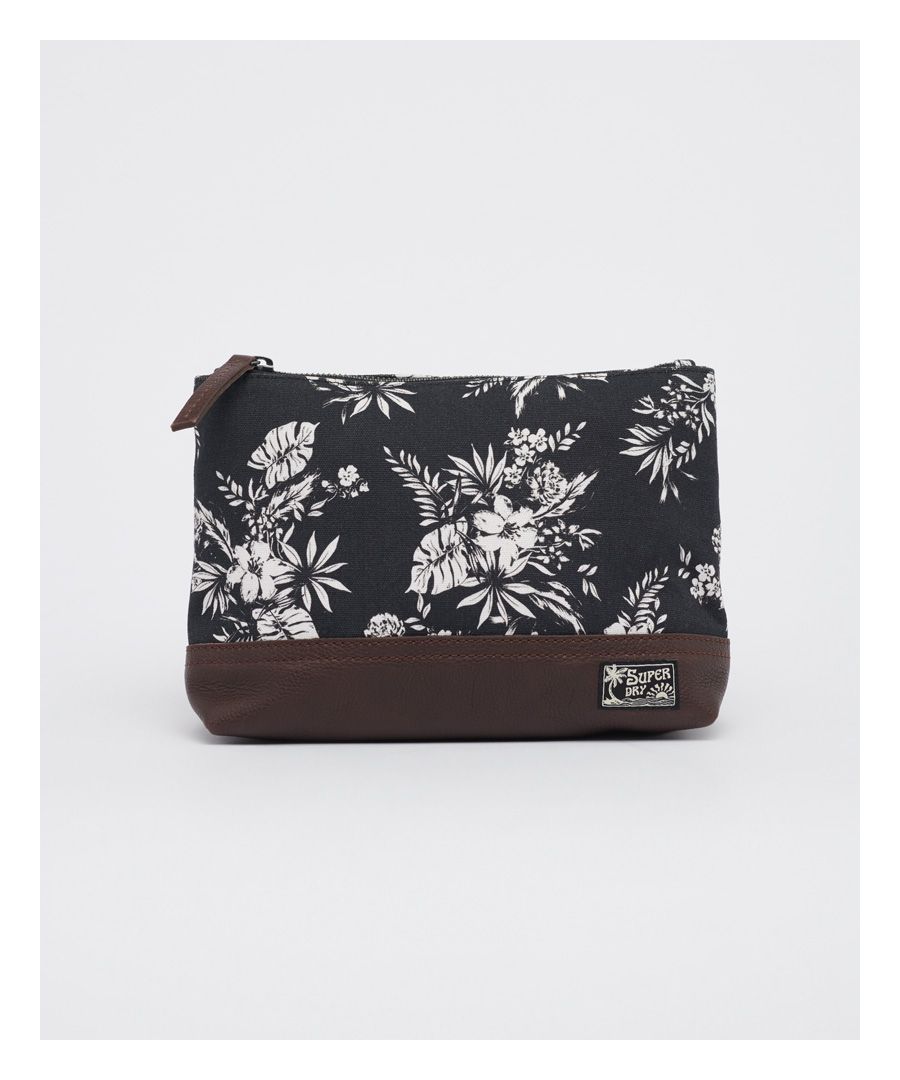 A travel essential the Elsie Printed Wash Bag features a main zip fastening, internal zip pocket, all over print and a signature logo patch.Zip fasteningInternal zipped pocketAll over printSignature logo patchH 16cm x W 28cm x D 8cm