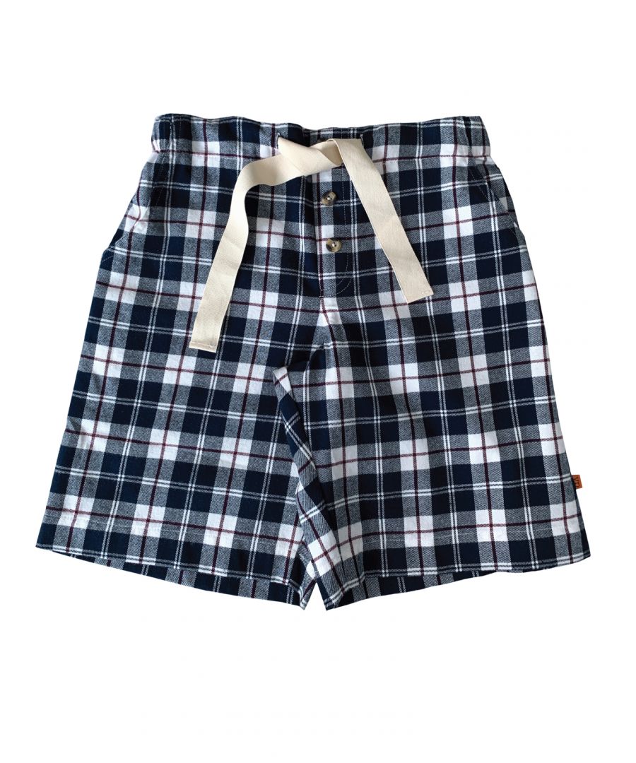 Navy check pyjama shorts by Vanilla Park\nA timeless navy check has been given the Vanilla Park treatment in our Kelby pyjama shorts. Made from brushed, 100% cotton, the PJ shorts have been beautifully finished with cotton trims. Fully elasticated at the waist with an adjustable front drawstring, they have two side pockets and a patch pocket on the back. Team them with one of our jersey T-shirts for the perfect loungewear set.\nPlease check our size guide before ordering. \n\nFeatures:\n100% Cotton\nMachine Washable\nSuper soft luxury brushed cotton fabric\nComfortable jersey inner waistband