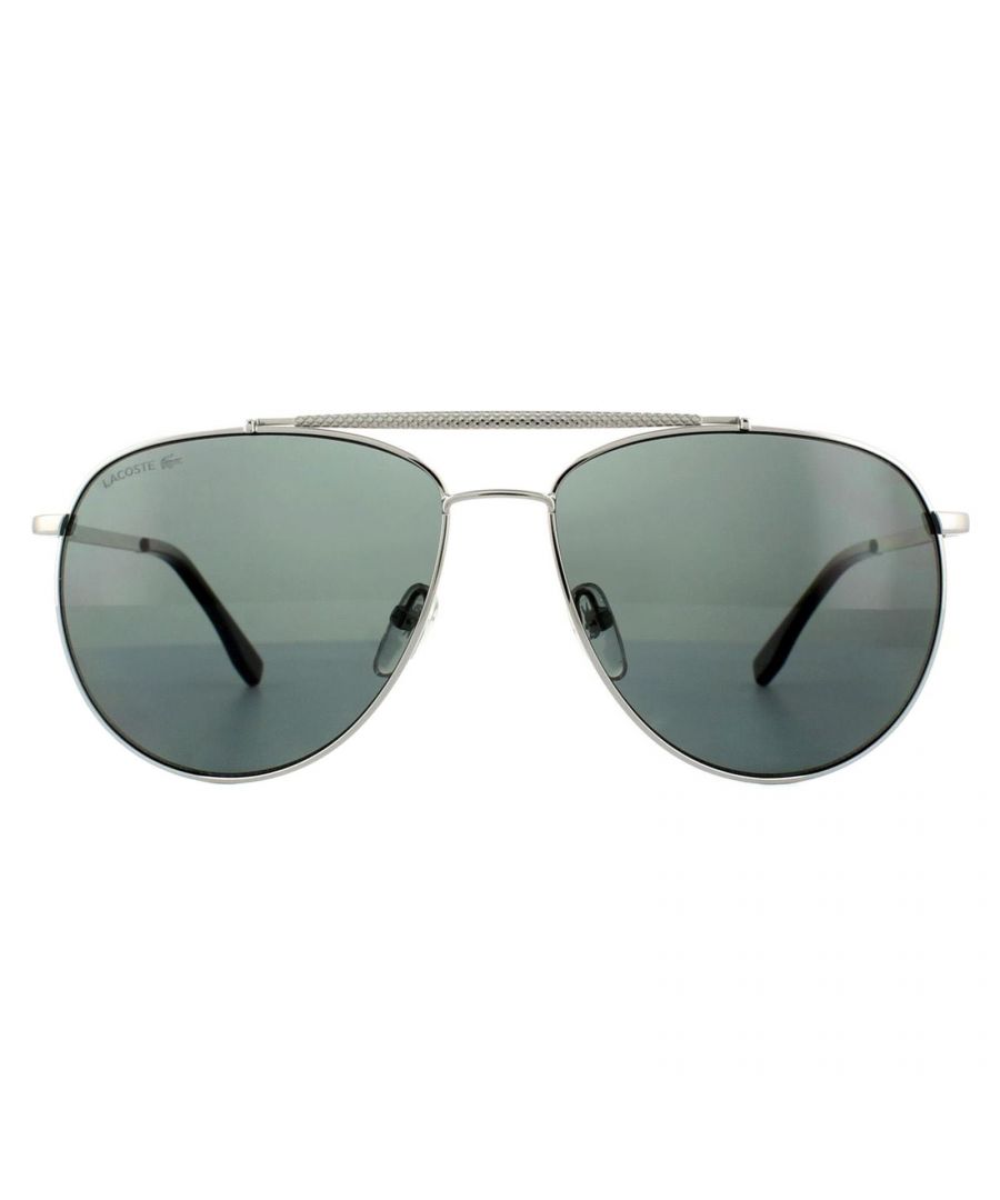 Lacoste Sunglasses L177SP 033 Gunmetal Grey Dark Grey Polarized are a classy pilot style with textured temples and matching brow bar for a luxurious chic finish. The Lacoste lettered logo at the temples completes these cool aviator Lacoste shades.