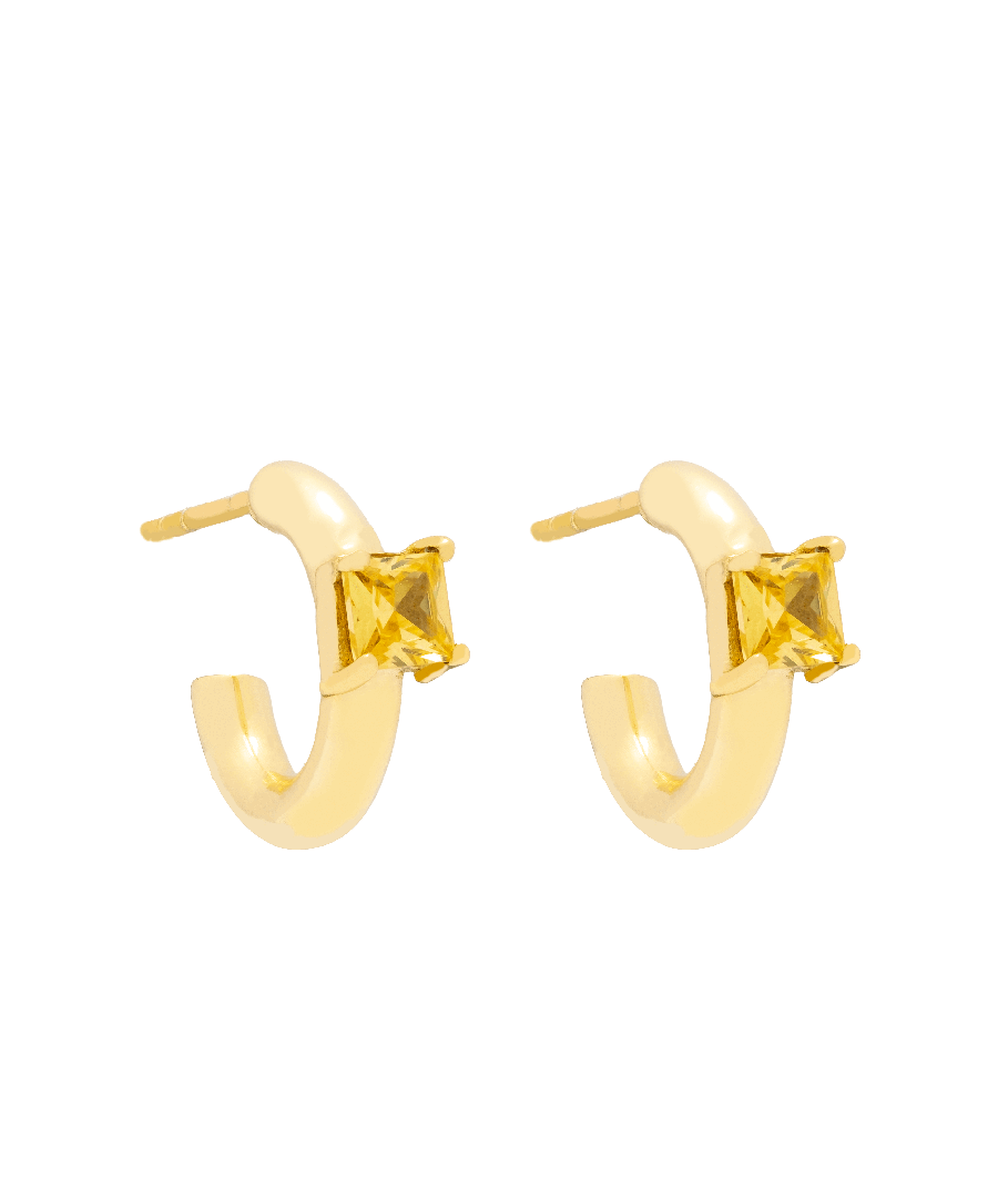 No doubt... our favorite golden earrings! We wanted to offer you the basic thick gold earring but with a special touch: the stone! It gives a special touch in a super discreet way and you will be able to wear them in your day to day or for special occasions if you like the minimal.  Color: white, navy blue.\n Stone: LapisLázuli, Moonstone.\n Composition: 24 carat gold.\n Butterfly closure.\n Size: 3.0 cm.\n Weight: 1 to 5 gr.