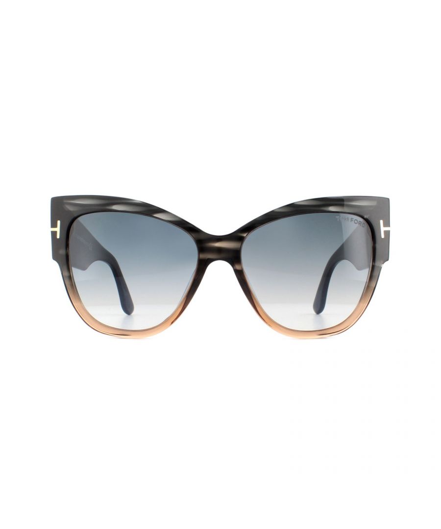 Tom Ford Sunglasses Anoushka 0371 20B Grey and Brown Crystal Grey Blue Gradient have taken the cat's eye shape to the ultimate extreme with these bold, exaggerated vintage look that has been massively popular. Thick temples featuring the iconic T bar Tom Ford signature complete these glamorous and striking Tom Ford sunglasses.