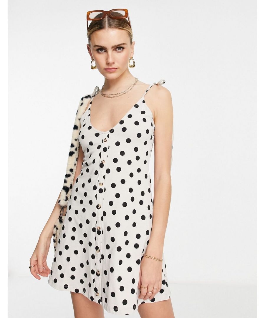 Dress by ASOS DESIGN Gotta love polka dots Scoop neck Tie straps Button-through front Slim fit Sold by Asos