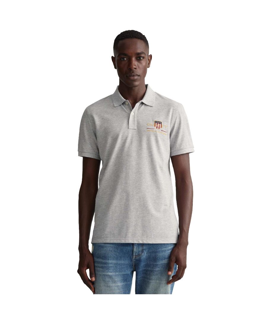 These Original Mens Designer Short Sleeve Gant Polos feature the brands vintage-inspired archive shield, embroidered on the chest, a Contrasting Trim and a Button-Down Collared Neckline. Crafted With 100% Cotton, these Lightweight and breathable Regular Fit Polos are Suitable for Casual or Workwear.