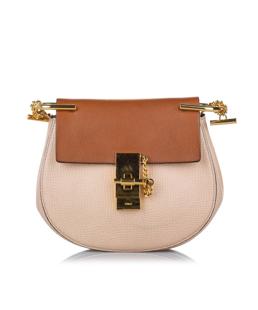VINTAGE. RRP AS NEW. The Drew features a grained leather body, a gold toned chain strap, a top flap with pin-lock closure, and an interior slip pocket.Exterior bottom is out of shape. Buckle is scratched. Interior lining is discolored.\n\nDimensions:\nLength 17cm\nWidth 18cm\nDepth 5.5cm\nShoulder Drop 54cm\n\nOriginal Accessories: Dust Bag\n\nColor: Brown x Beige x Brown\nMaterial: Leather x Calf\nCountry of Origin: ITALY\nBoutique Reference: SSU173128K1342\n\n\nProduct Rating: GoodCondition\n\nCertificate of Authenticity is available upon request with no extra fee required. Please contact our customer service team.