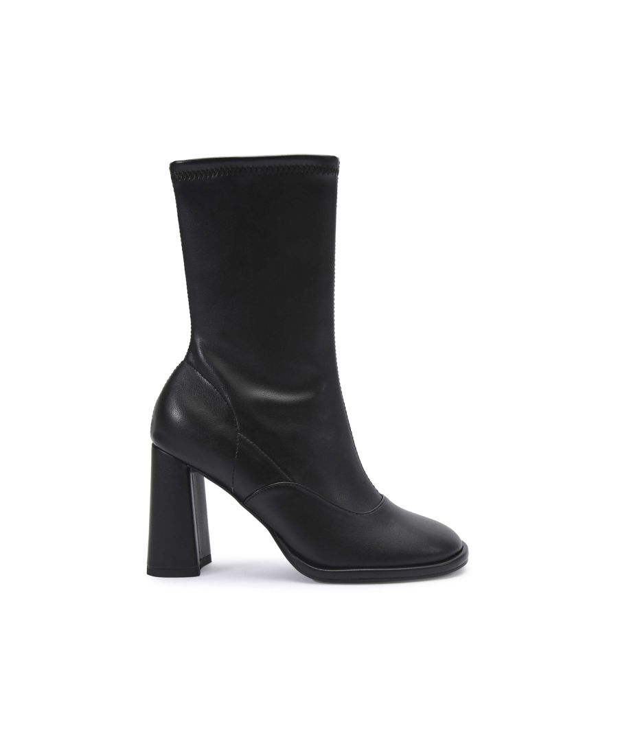 The Timber Sock is an ankle boot with high ankle in black. The inside of the ankle features a zipped for comfort. Heel height: 9cm. Black toned KG stud on the outer sole. This product is registered with The Vegan Society. Material: Leather alternative.