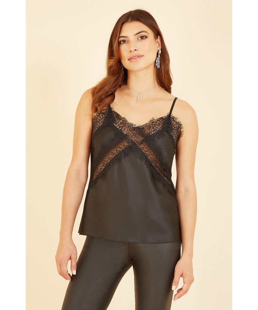 This Yumi black Cami top is the perfect way to complete your weekend look. The ultimate way to make 'jeans and a nice top' come to life. The satin fabric lends itself to a luxurious and chic look, with the lace detail amping up the weekend vibes. With adjustable straps so you can get the perfect fit for your body. Style with a  pair of jeans, fitted blazer matching heels. Size reference, Small 8-10, Medium 10-12, Large 12-14.