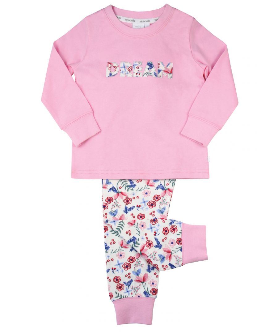 Girls Slim Fit 'DREAM' Pyjamas. \n\nOur favourite winter floral print is now adorning these cute DREAM pyjamas. The super-soft long-sleeved pink top with a DREAM applique and winter floral printed elasticated-waist bottoms are comfortable to wear – perfect for film nights and sleepovers.  Not all children like baggy clothing at bedtime so these are perfect for the girl who prefers a snug legging style fit.\nFeature:\nAll-over floral print\nElasticated waistband\nEasy, pull-on style\n100% cotton\nMachine washable\nRib cuff on bottoms\nSlim fit