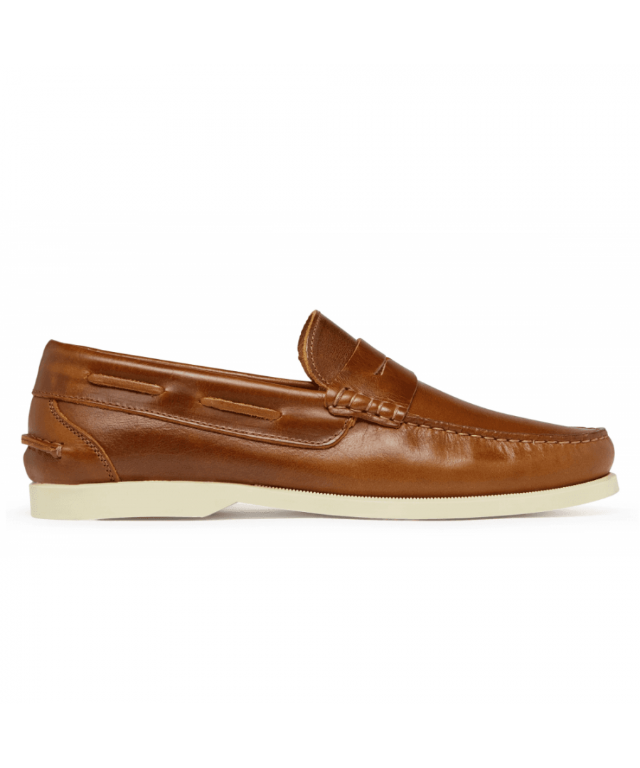 Moccasin constructionLeather upperLeather liningRubber solePadded footbedMade in Spain