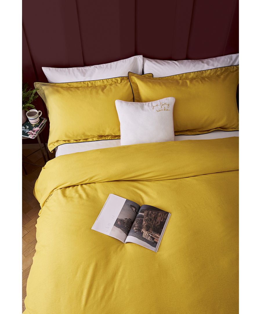 Every morning will be a good morning when you wake up under this sumptuous duvet cover. Crafted from a cotton and linen mix it has a luxuriously soft finish so we won't blame you if you stay in bed all day! If you like to keep your bedding simple but always stylish then you'll love the all over sunshine-inspired antique gold colour with pops of royal navy piping. The duvet cover has matching Oxford pillowcases available seperately. BCI Cotton, Made in Pakistan.