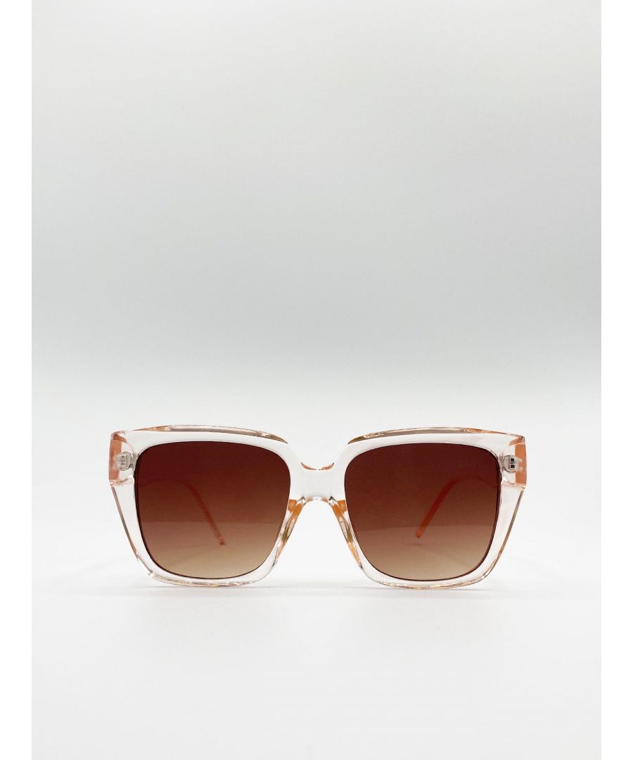 Crystal Peach Oversized Square Sunglasses with Brown Lenses\nFrame Colour: Crystal Peach\nLens Colour: Brown\nFrame Material: Plastic\n\nOne Size\nFDA Approved\nUV 400 PROTECTION IN ACCORDANCE WITH 89/686/EEC BS EN ISO 123-1:2013\nSKU: SG90208190