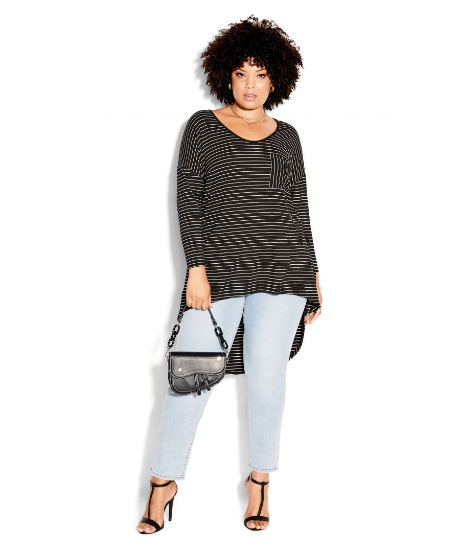 A corner piece for every collection, who doesn't love a striped tee? Boasting soft stretch fabrication, high coverage hi-lo hem, and functional pocket detail, this trending tee will have you lounging about in style. Key Features Include: - Scoop neckline with cross-over back - Full-length dolman sleeves - Pull-over style - Darted bust for shape - Single breast pocket - Relaxed fit - Soft stretch fabrication - Hi-lo hip-length hemline Complete the set with mid-wash distressed jeans and chunky white sneakers.
