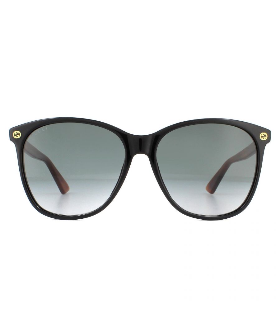 Gucci Sunglasses GG0024S 003 Black Brown Grey Gradient are a super stylish minimalist design with the classic interlocking GG Gucci logo at the front temples and bee design on the temple tips.