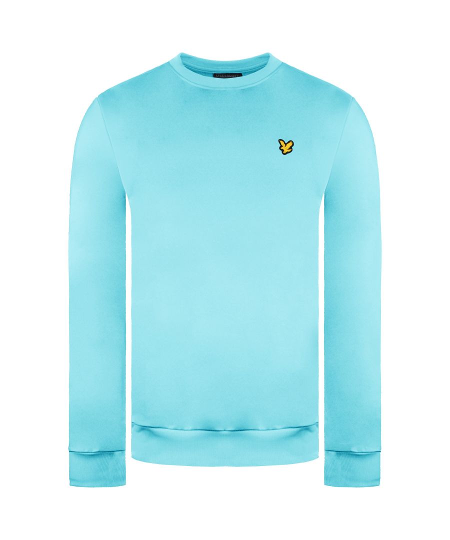 The Lyle & Scott Golf Crew Neck Sweatshirt is a core piece of your golf collection. A simple men’s golf midlayer in a regular cut, featuring a classic ribbed crew neck, hem and cuffs and a fleece lining for warmth through the seasons, and a silicone Lyle & Scott badge at the chest.