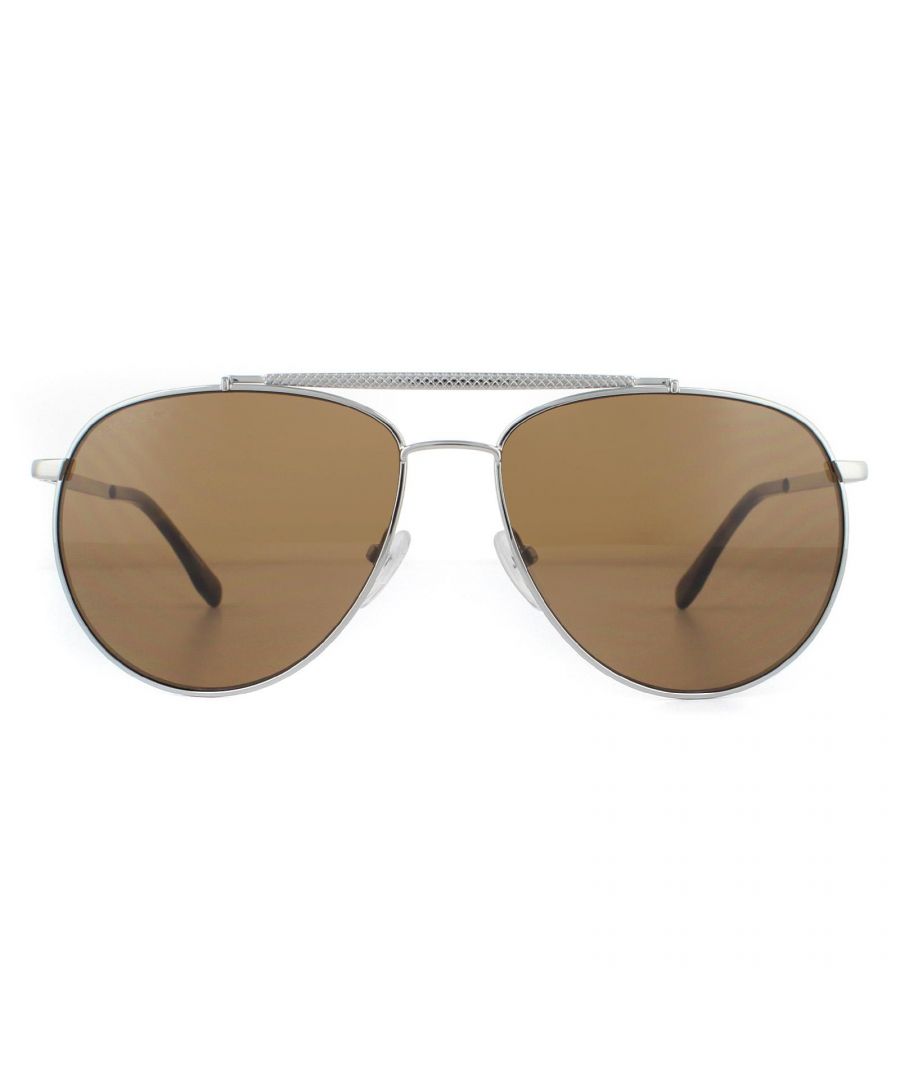 Lacoste Sunglasses L177S 033 Gunmetal Brown are a classy pilot style with textured temples and matching brow bar for a luxurious chic finish. The Lacoste lettered logo at the temples completes these cool aviator Lacoste shades.
