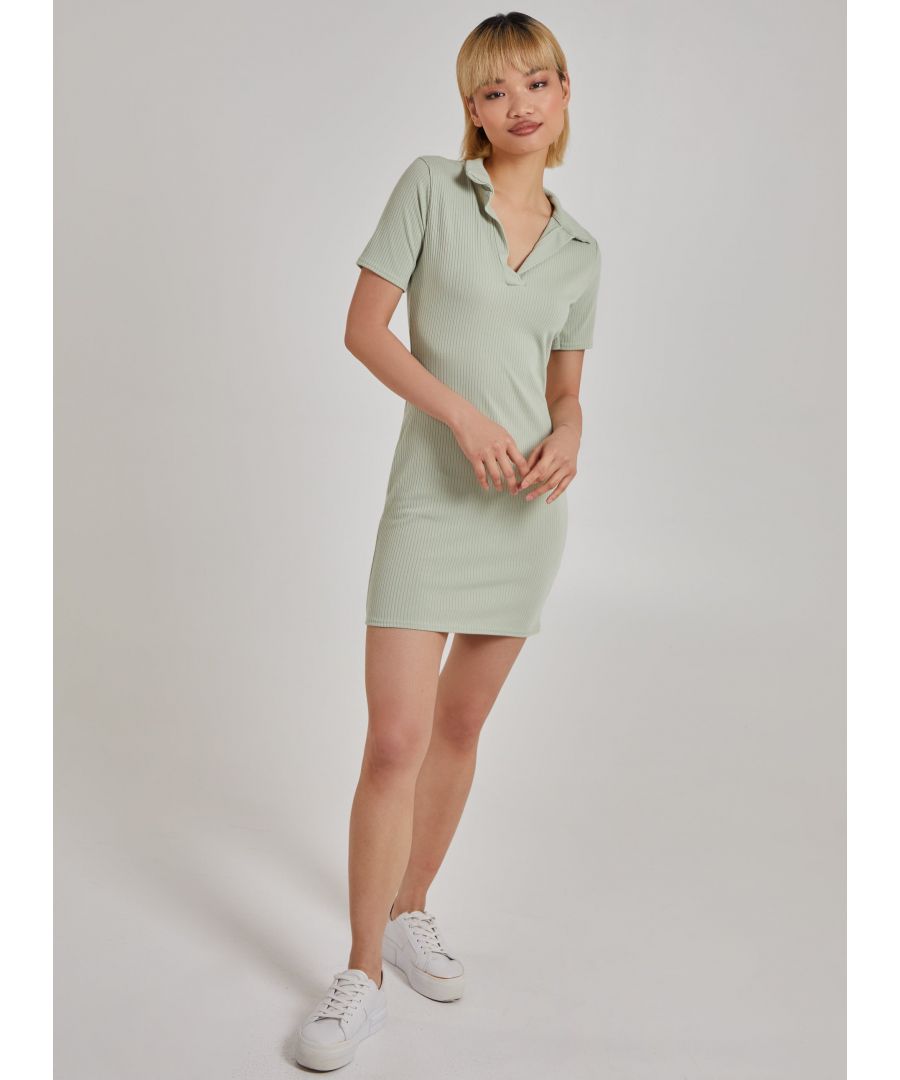 Solve all of those â€œnothing to wearâ€ dilemmas wearing this little ribbed mini dress! An easy option to throw on and go! 95% Polyester, 5% ElastaneMade in UKDo Not BleachDo Not Tumble DryCool Iron On ReverseDo Not Dry CleanModel wearing size 8Model height: 5'9