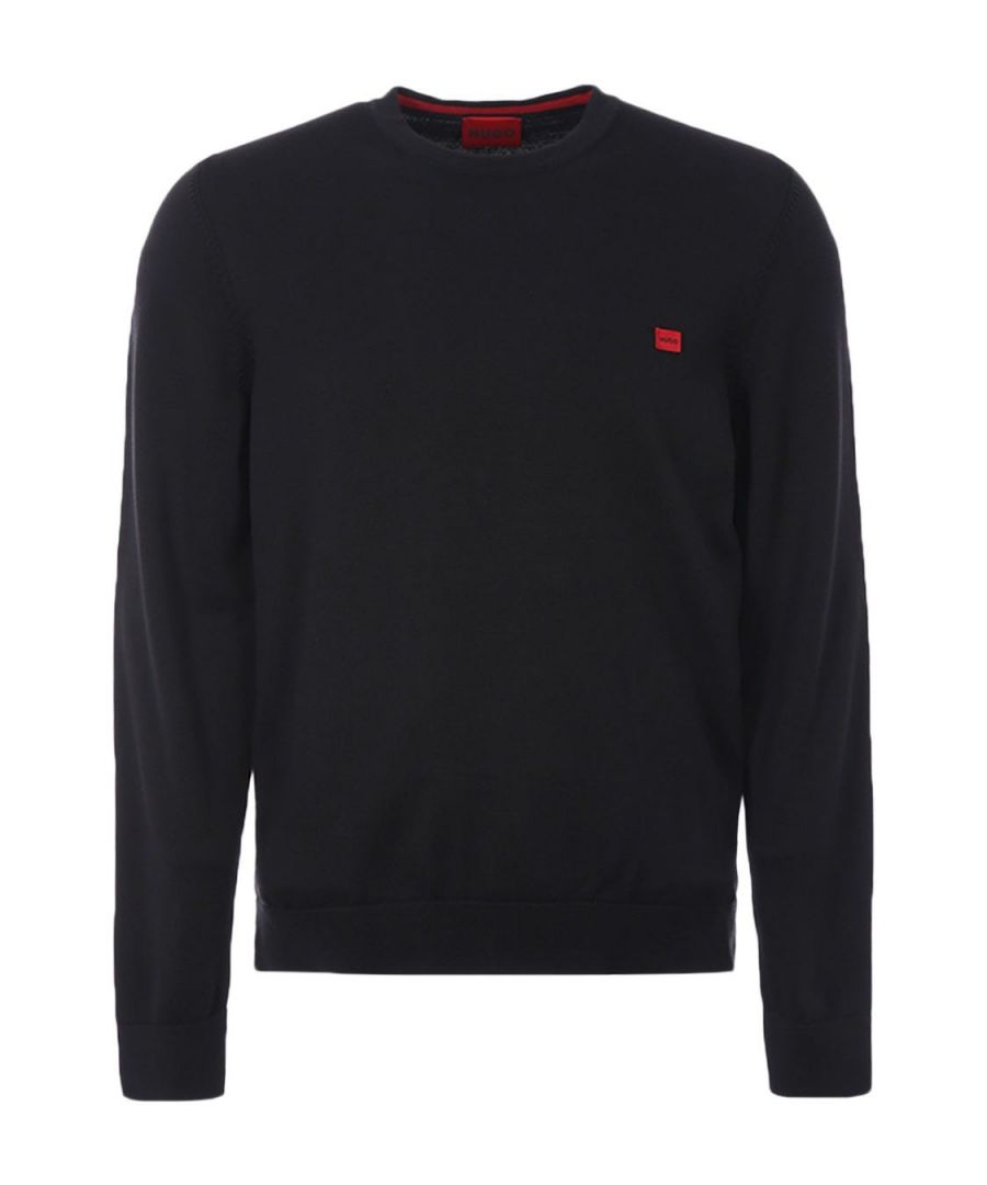 A wardrobe staple from HUGO, the Red Logo Label Organic Cotton Jumper is the perfect piece to refresh your knitwear this season. Crafted from organic cotton knit offering a soft feel and natural breathability. Featuring a ribbed crew neck and long sleeves. Finished with the iconic red HUGO woven logo label on the chest. Regular Fit, Organic Cotton Knit, Ribbed Crew Neck, Long Sleeves , Ribbed Cuffs & Hem, HUGO Branding. Style & Fit:Regular Fit, Fits True to Size. Composition & Care:100% Organic Cotton, Machine Wash.