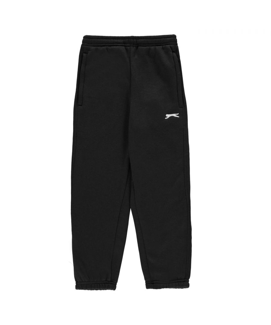 Slazenger Fleece Pants Junior - These Slazenger Junior Fleece Sweat Pants feature an elasticated waist band with a drawstring fastening for a secure fit. While the minimalistic design keeps them fashionable and simple, the fleece lining makes them super cosy, alongside the elasticated cuffs for a great combination of warmth and comfort. The look is then completed with Slazenger branding on the front. Do not miss out on these ones.  > Boys Jogging Bottoms > Sweat Pants > Drawstring fastening > Classic > Brushed fleece lining > Two open pockets > Piped detail > Regular fit > Stitching detail > Elasticated waist > Keep away from fire > Slazenger branding > 65% Polyester 35% Cotton > Machine washable at 40 degrees
