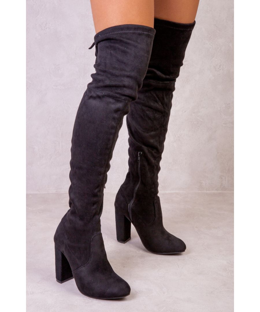 The sleek design features an over-the-knee profile with lace-up detail at the back and will pair beautifully with your favorite cocktail dress or a skirt. You'll be dancing all night in these heels, and they're super comfortable too! With a soft suede finish, this classic boot will go with any outfit or occasion that you could think of.