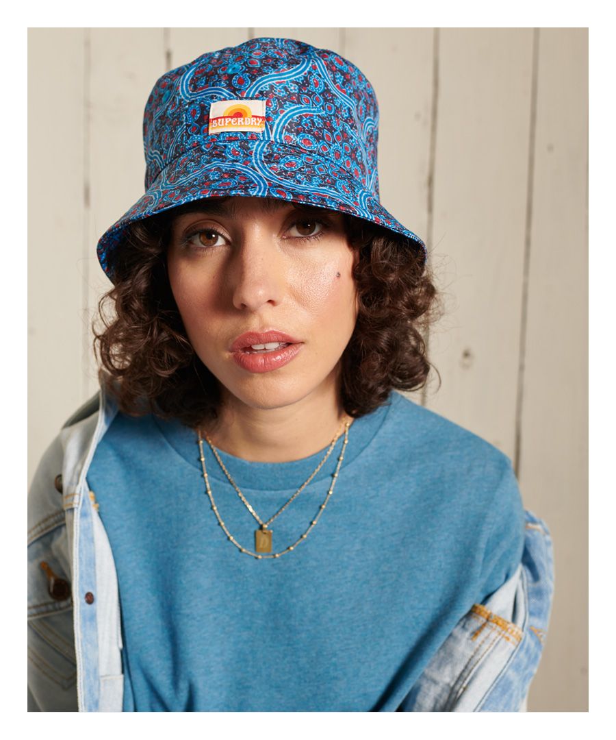 Stay on-trend while being festival-ready this season with the Bucket Hat, the perfect statement piece to complete any outfit.Stitch detailing to the brimEyelet detailingClassic bucket designSignature logo patchInner circumference: S/M - 56cm, M/L - 59cmAll over print
