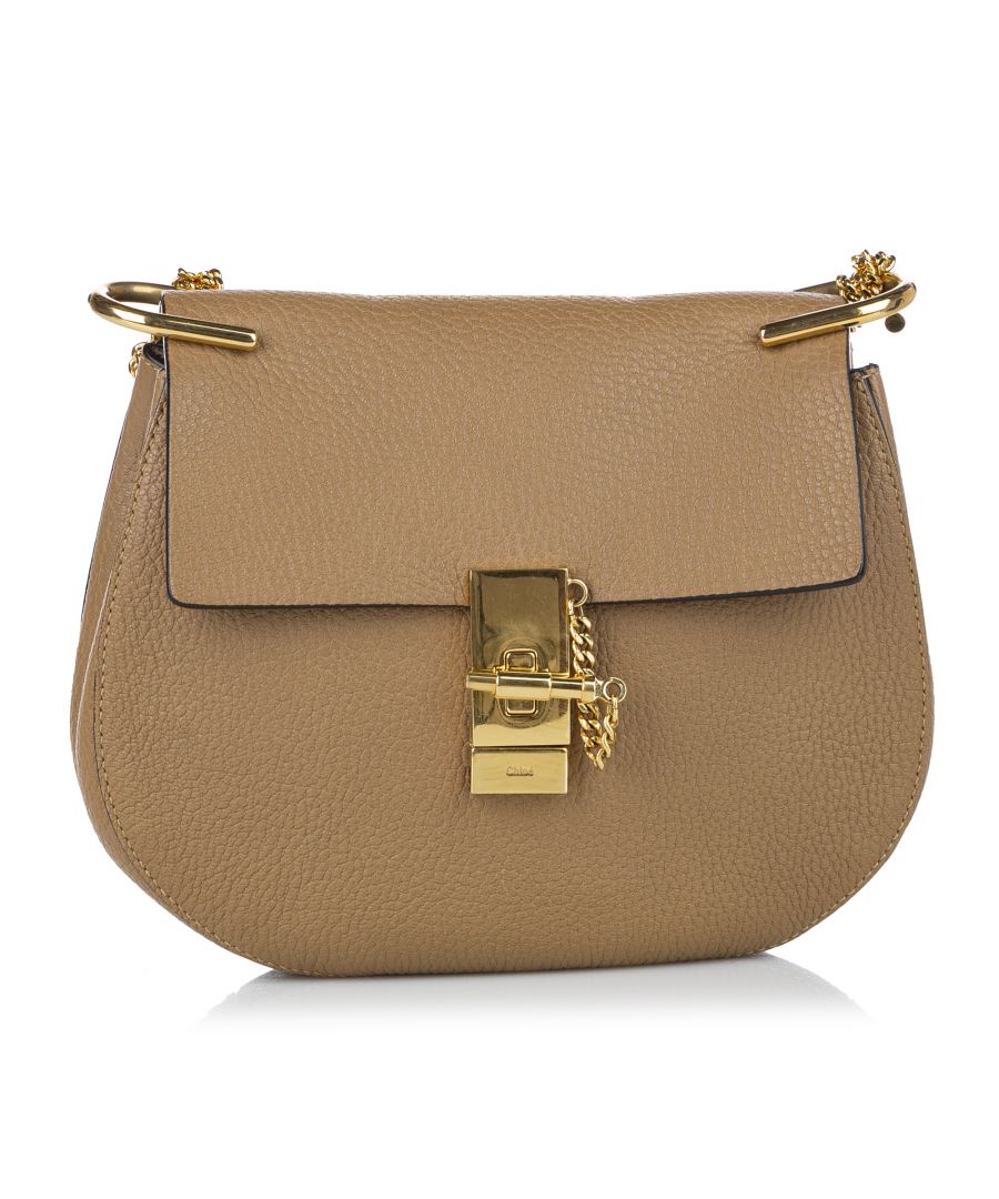 VINTAGE. RRP AS NEW. The Drew features a leather body, a gold toned chain strap, a top flap with pin-lock closure, and an interior slip pocket.Metal Attachment Scratched. \n\nDimensions:\nLength 20.5cm\nWidth 23cm\nDepth 7cm\nShoulder Drop 51cm\n\nOriginal Accessories: Dust Bag, Authenticity Card\n\nSerial Number: 03 15 70 65 6\nColor: Brown x Beige\nMaterial: Leather x Calf\nCountry of Origin: Italy\nBoutique Reference: SSU142736K1342\n\n\nProduct Rating: GoodCondition\n\nCertificate of Authenticity is available upon request with no extra fee required. Please contact our customer service team.