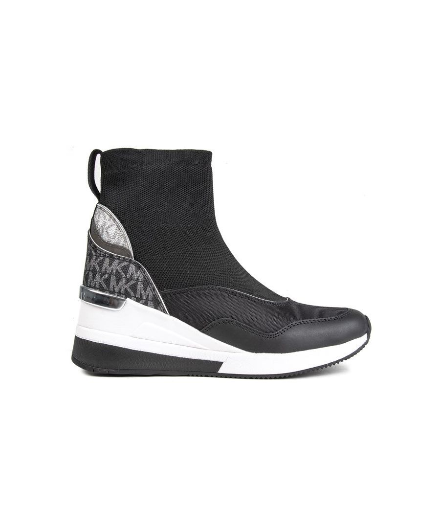 Womens black Michael Kors skyler bootie trainers, manufactured with nylon and a rubber sole. Featuring: wedge sneaker, sock like fit, textile lining and sock, mk branded heel tab and cushioned lining to heel.