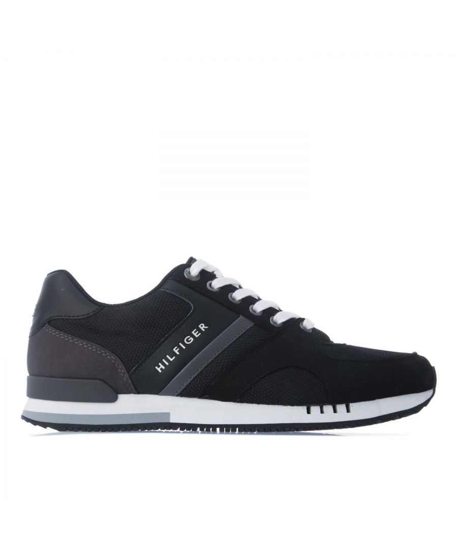 Mens Tommy Hilfiger Maximilian Trainers in black.- Suede and Textile upper.- Lace up fastening.- Metal top eyelets with Tommy Hilfiger branding.- Low-top.- Tommy Hilfiger branding on tongue and side.- Tommy Hilfiger flag embroidery at heel.- Rubber outsole.- Textile upper  Textile lining  Synthetic sole.- Ref: XM0XM01350BDS