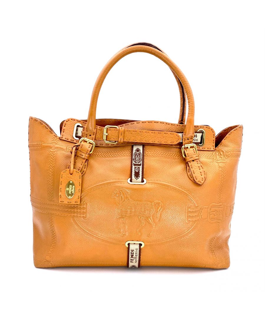 VINTAGE. RRP AS NEW. Luxury with class - Selleria Grand Borghese Bag accented with a stately horse embossed on the front.From the Selleria range - hand-stitched seams and produced in a limited number as shown on the metal plaque inside the bag (49-31-16612).Open top. Exterior is made with caramel grained colored leather body and golden/silver hardware metal hardware. It has dual leather handles with Fendi stamped on the buckle straps.Interior is in linen fabric with a zipper pocket and metal brand label attached.\n\n40 x 28 x 18 cm. Handle drop 14 cm.\nCode: 12372-3BN156-ANC-099. Also with RFID tag.\nVery good (8/10): Gently used, with slightly more noticeable signs of wear at edges. Corners in excellent condition.  Some pen marks on the inside fabric. These will not affect the wear or use of the item, the descriptions and photographs of the item will clearly indicate the condition of the item.