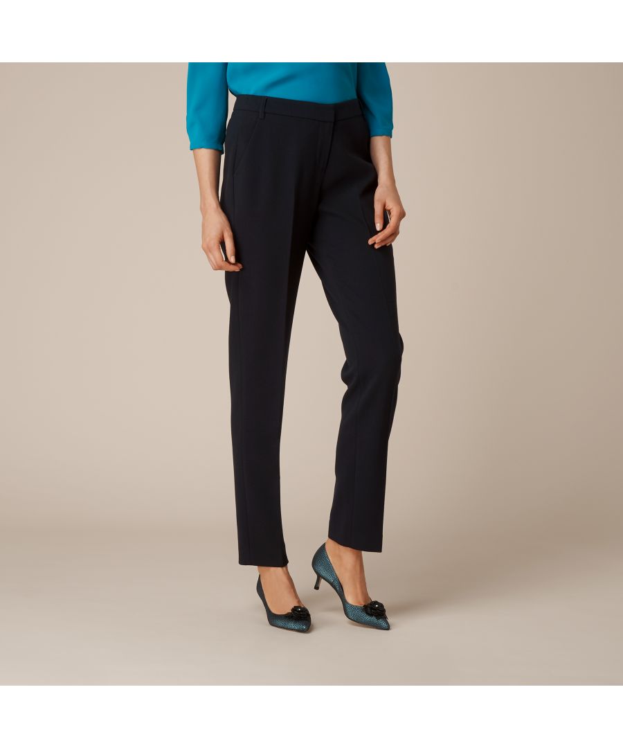 The Evie Trouser will add a sharp touch to staple white shirts, sweaters and everything in-between. Cut with a flattering slim-leg silhouette, this multitasking staple is stripped of detail to create a pant that can be restyled and reinvented time and time again.