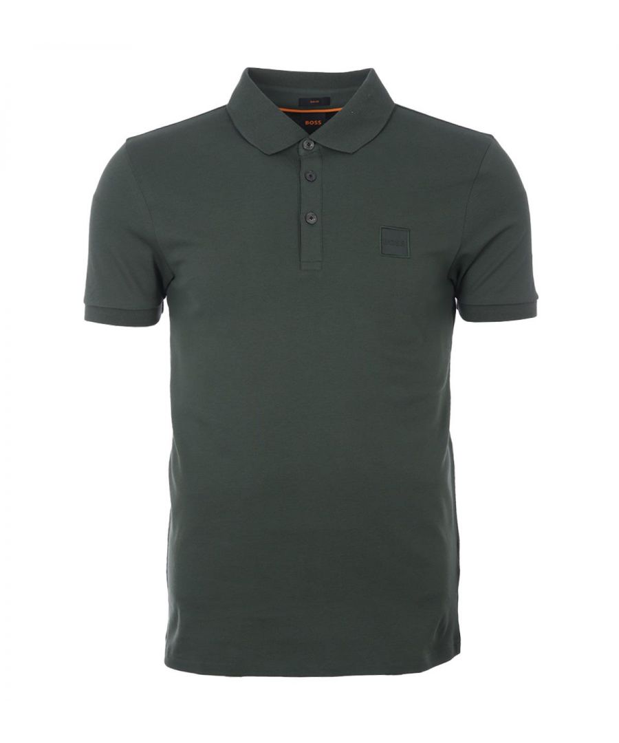 A classic BOSS polo shirt in a defined slim fit, crafted from sustainably sourced cotton pique with added stretch ensuring day-long comfort and a super soft feel. Featuring a ribbed polo collar, a two-button placket and short sleeves with ribbed cuffs. Finished with the signature BOSS logo patch at the chest.Cotton made in Africa - an initiative of the Aid by Trade Foundation, one of the world\'s leading standards for sustainably produced cotton.Slim Fit, Sustainably Sourced Stretch Cotton Pique, Ribbed Polo Collar, Two Button Placket, Short Sleeves with Ribbed Ruffs, BOSS Branding. Style & Fit:Slim Fit, Fits True to Size. Composition & Care:97% Cotton, 3% Elastane, Machine Wash.