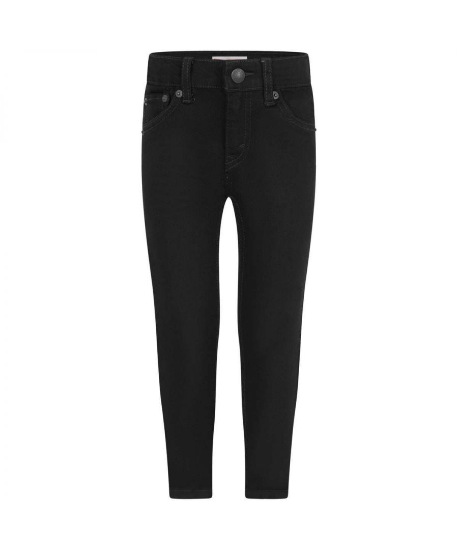 Boys black denim jeans from Levi's. Features an interior adjustable waistband with embossed button and zip-fly fastening, belt loops, tonal metal rivets and three front pockets. The reverse features two pockets, stitched leather patch on the waistban